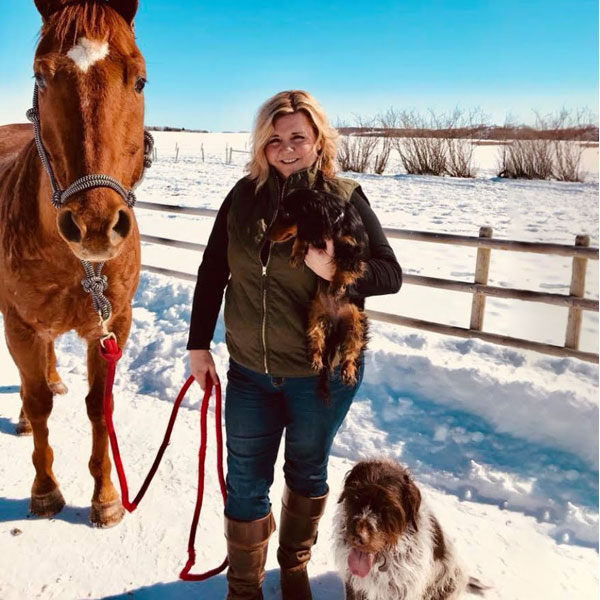 Kimberly with her dog and horse