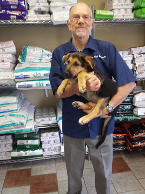 Dr. Mark holding puppy